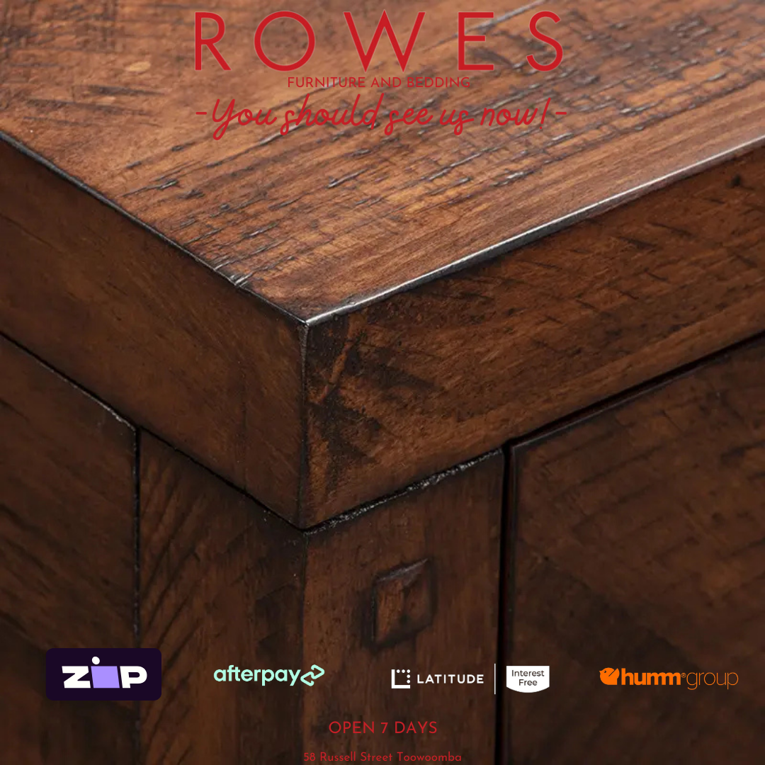 Close up of a wooden bedside top with Rowes branding.