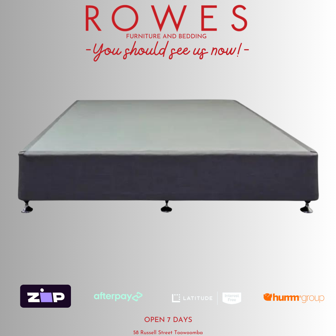 A designer bed base with a contemporary upholstered fabric finish in a bedroom setting, with branding and payment options visible.