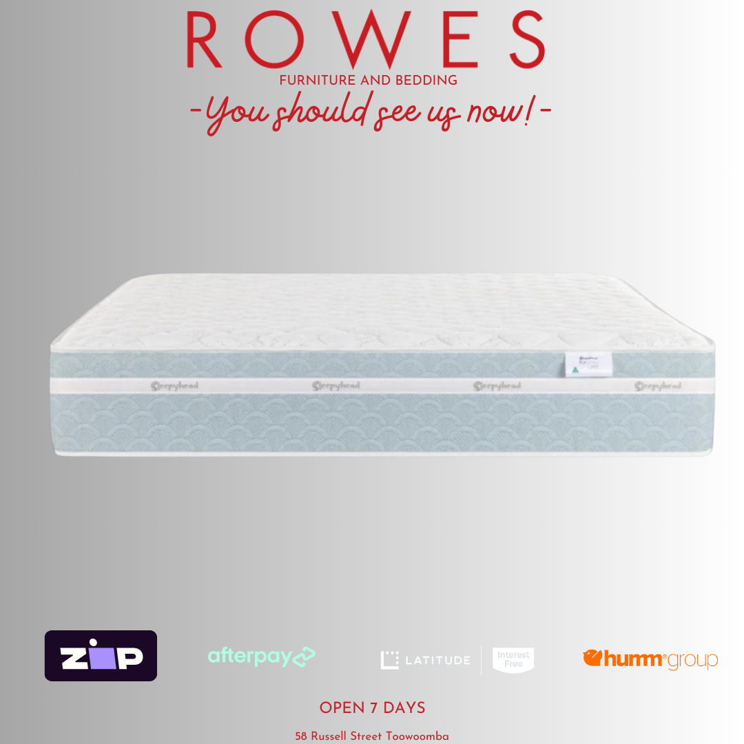 The image shows the top view of a white mattress with branding labels indicating the store 'Rowes - You should see us now!'. It also features logos for 'BedsRus' and 'Afterpay'.