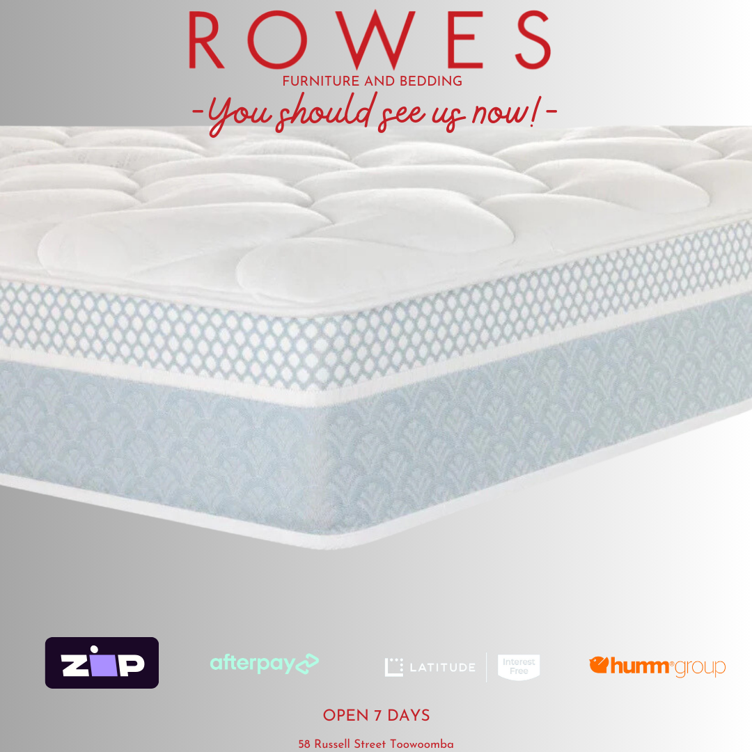 The image shows the top view of a white mattress with branding labels indicating the store 'Rowes - You should see us now!'. It also features logos for 'BedsRus' and 'Afterpay'.