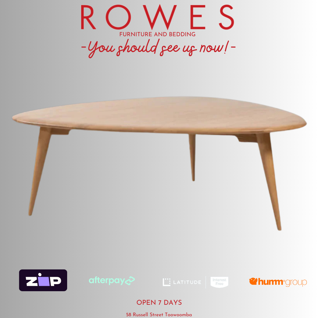 A Scandinavian-inspired wooden coffee table on a grey background, with a minimalist design featuring a smooth, flat surface and slender legs.