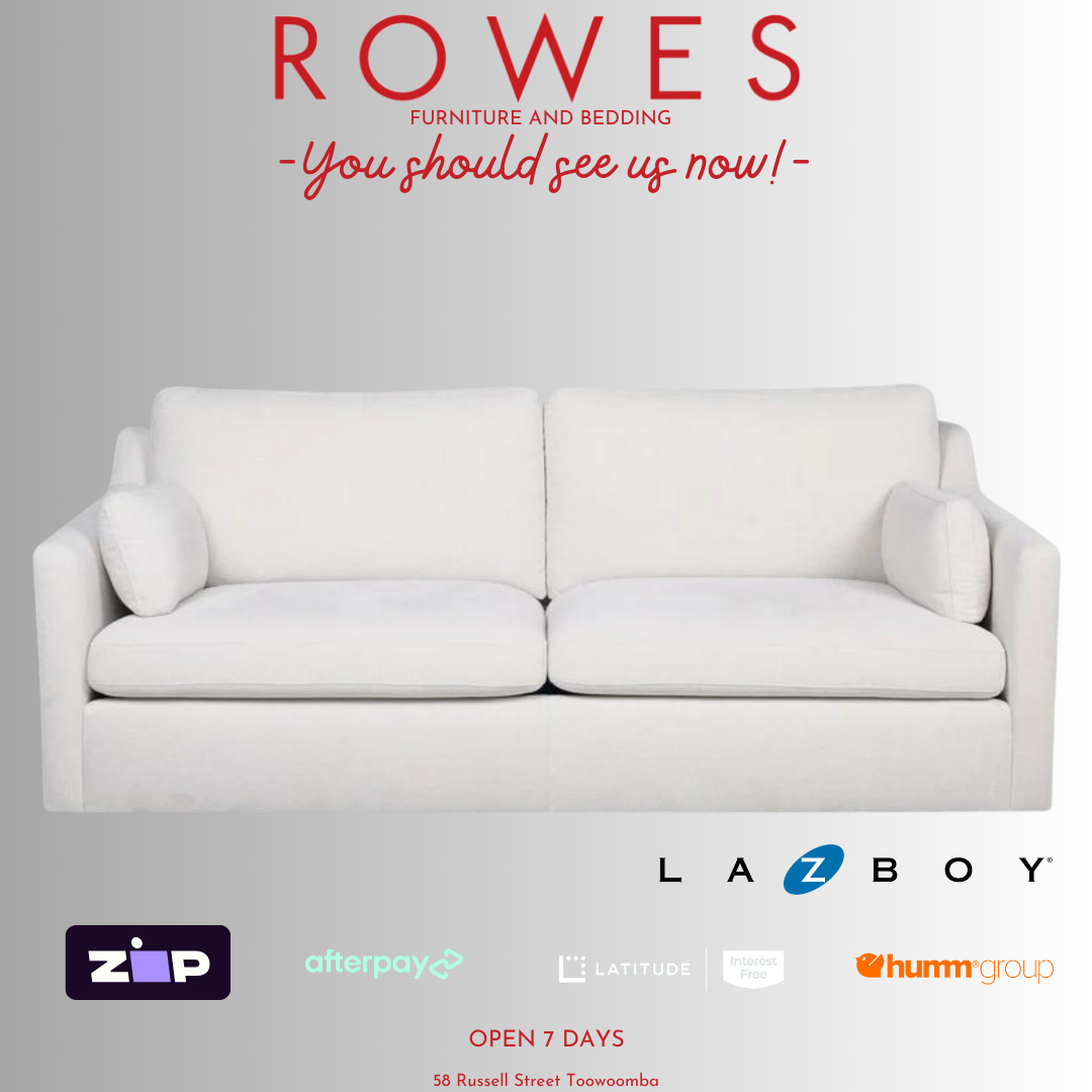A LaZboy Huntington sofa set, featuring a white color scheme, a streamlined silhouette, and sloped arm detailing.