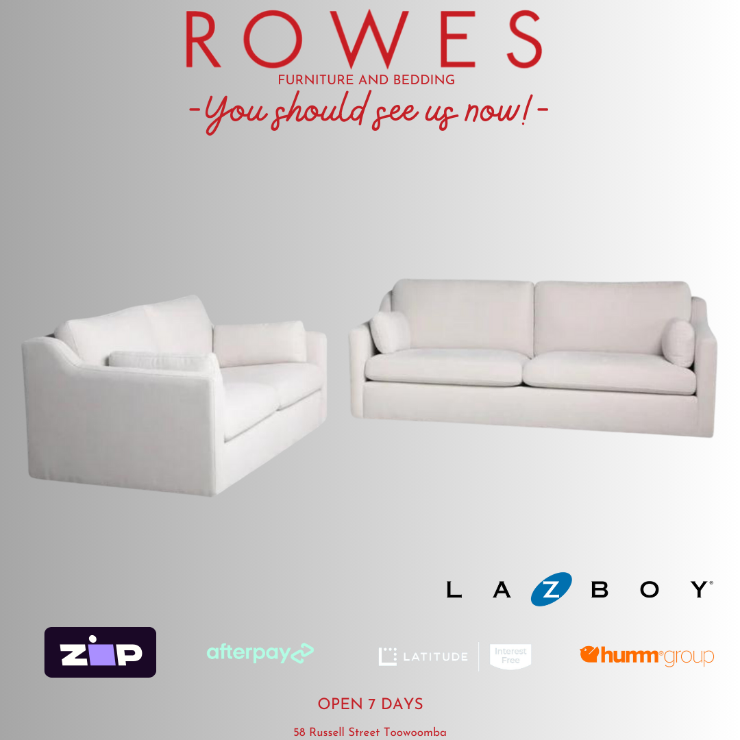 A LaZboy Huntington sofa set, featuring a white color scheme, a streamlined silhouette, and sloped arm detailing.