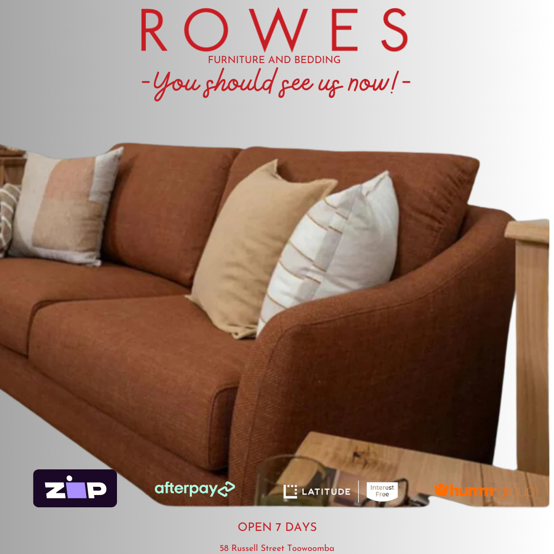 A set of brown upholstered living room furniture, including a sofa and armchairs around a circular wooden table, with a promotional banner at the top.