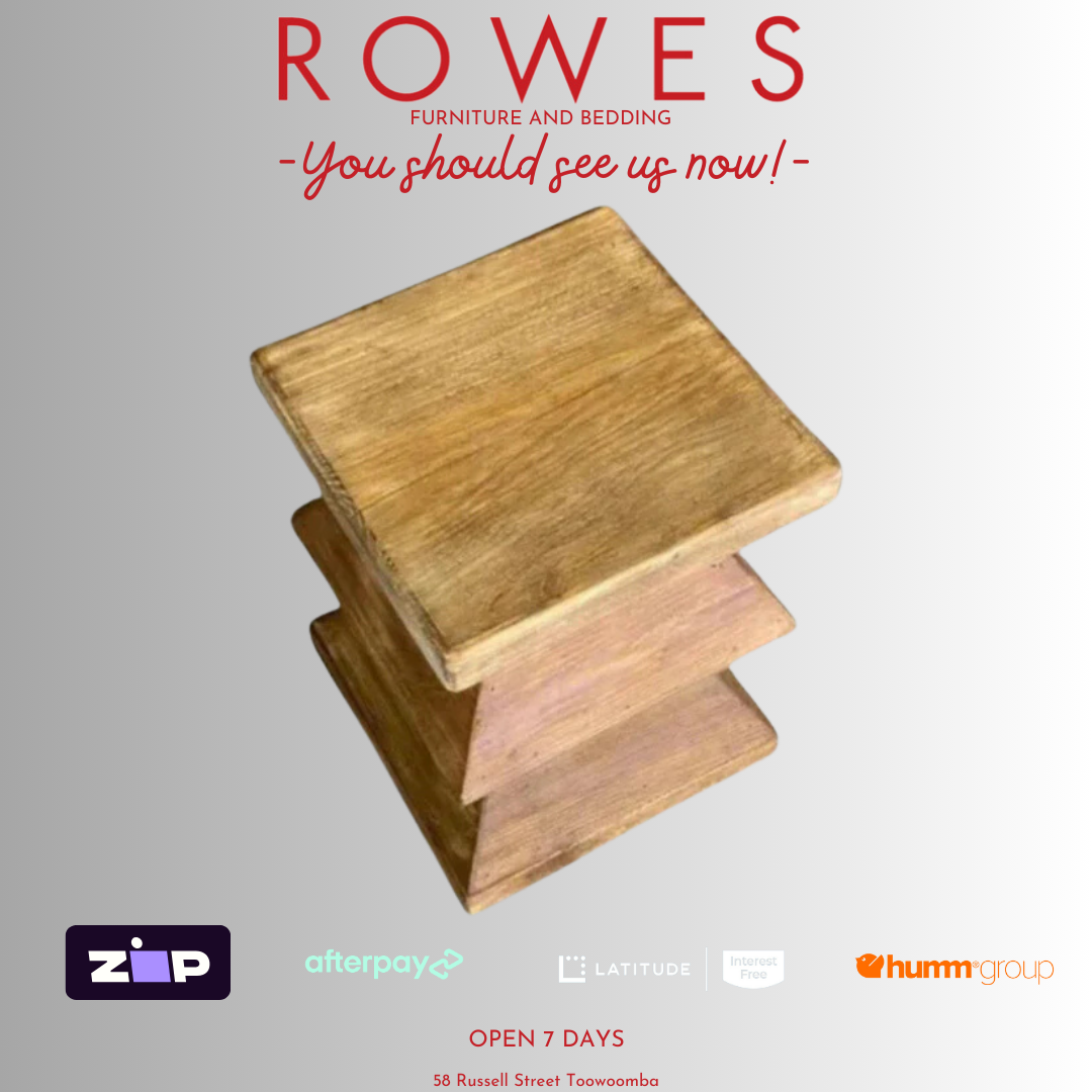A wooden bedside stool made of recycled pine, with visible natural cracks and knots, placed on a white background.