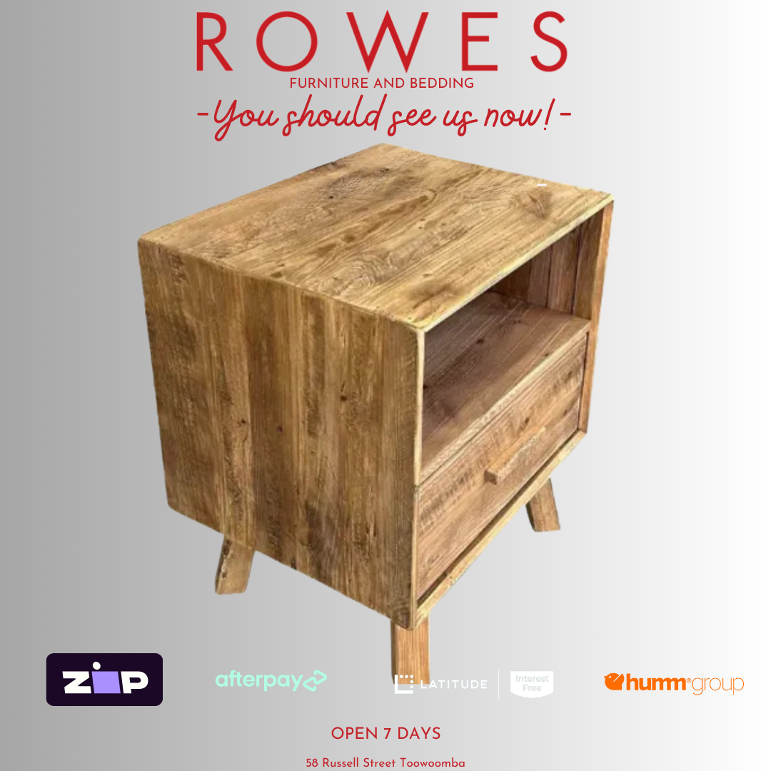 A chunky recycled pine bedside table with one drawer and one niche, featuring a natural wood finish.