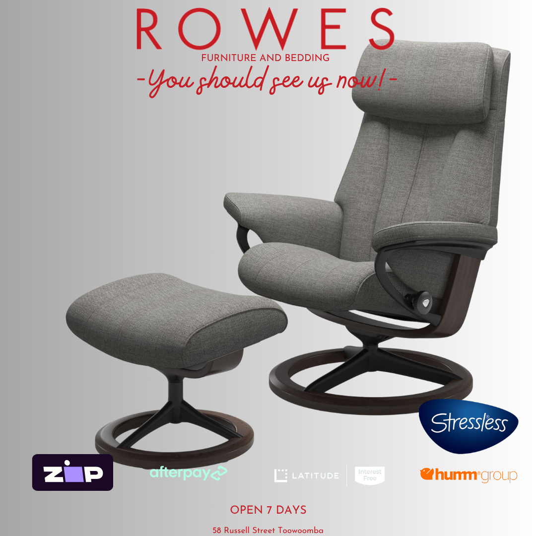 Gray recliner chair with ottoman on a light gray background, featuring the Stressless brand.