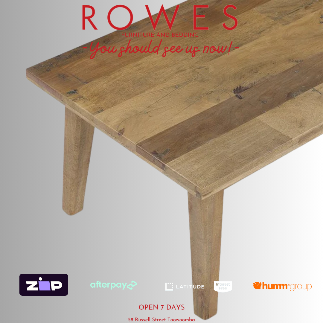 Wooden table with promotional text and logos on a gray background