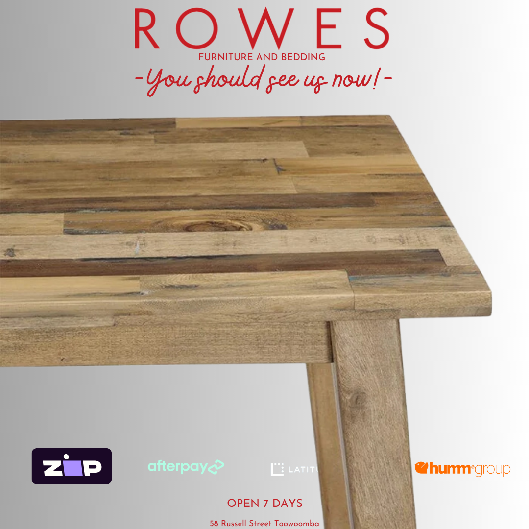 Wooden table with promotional text and logos on a white background