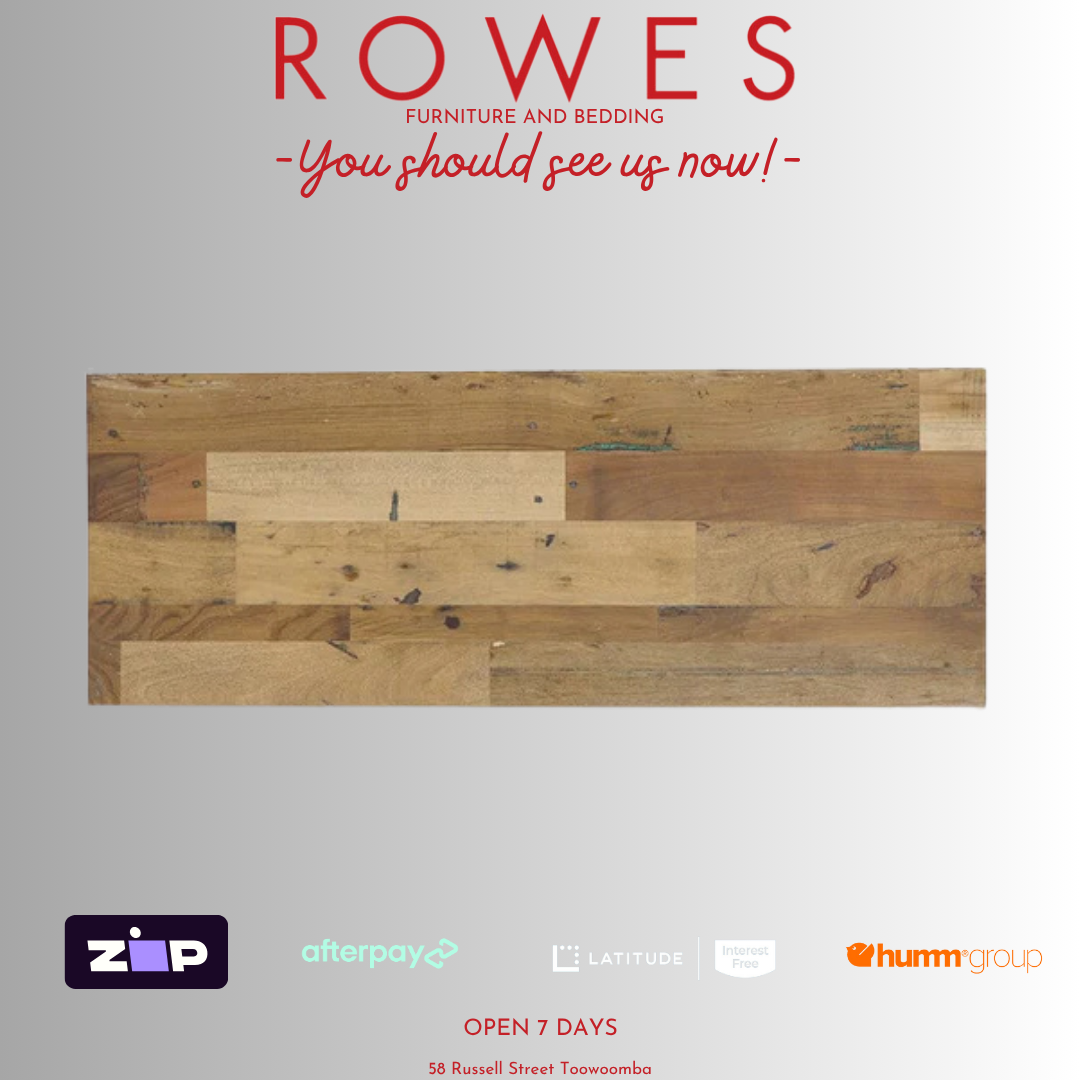 Wooden boards with 'Rowes' furniture and bedding advertisement on a gray background