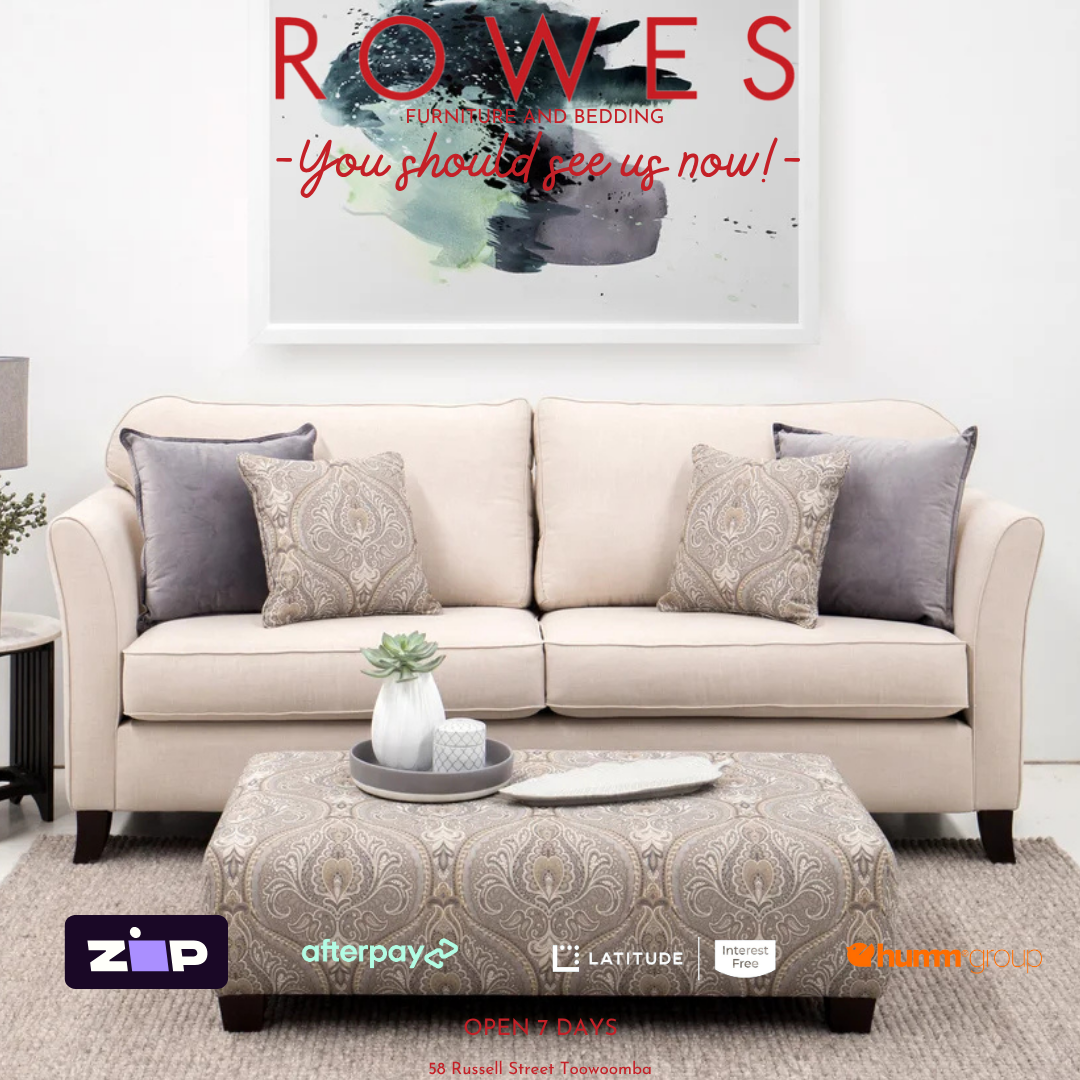 Beige sofa with decorative pillows in a living room setting, featuring Rowes Furniture and Bedding advertisement.