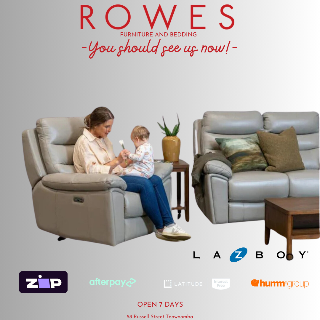 A person relaxing in a LaZboy Derby power reclining chair, with the chair in a seated position, showcasing the comfort and design of the chair.