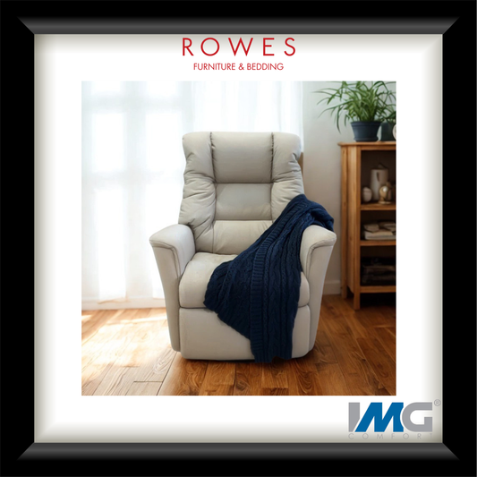 Beige recliner chair with a blue blanket in a room setting, featuring Rowes Furniture & Bedding logo.