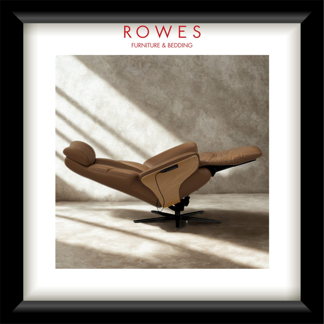Brown recliner chair in a room with sunlight filtering through curtains, branded 'Rowes Furniture & Bedding'.