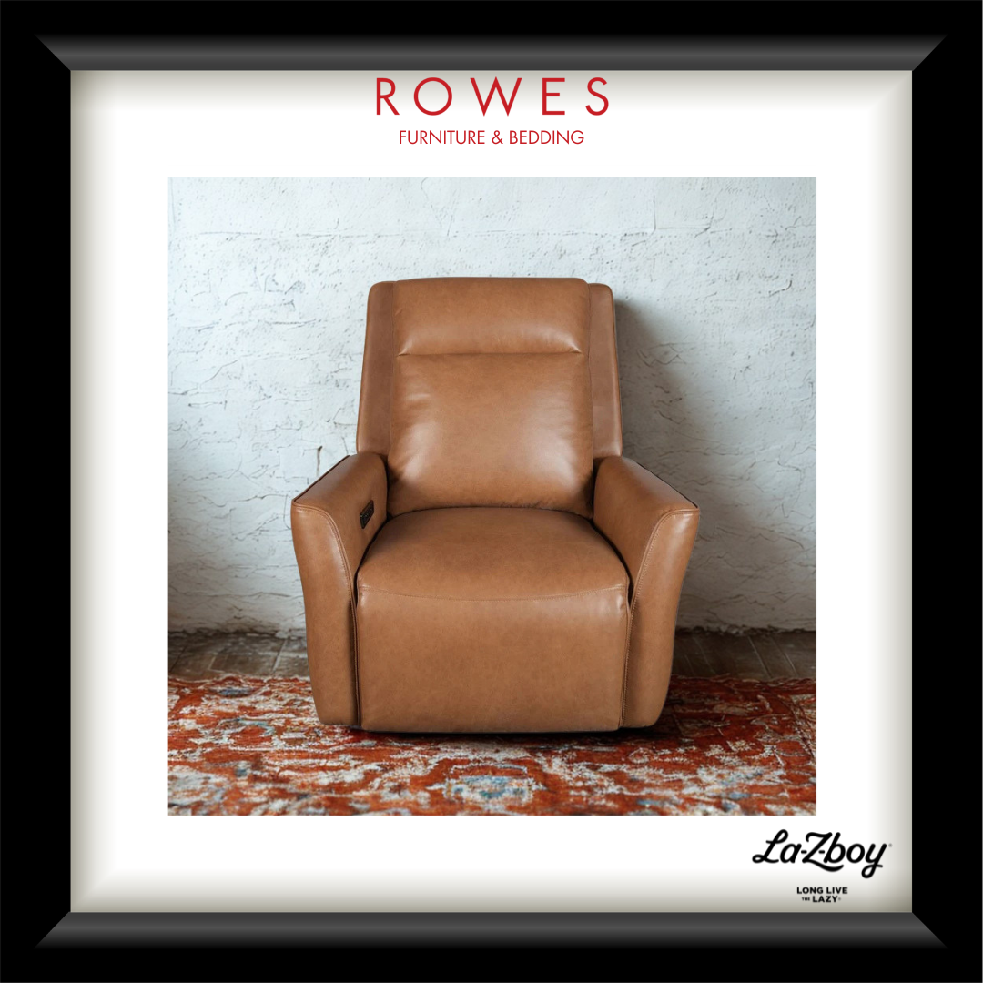 A framed product presentation featuring a tan leather recliner chair in the center, with the text 'ROWES FURNITURE & BEDDING' at the top and 'LaZboy' at the bottom. The image is matted with a white border and enclosed in a black frame.