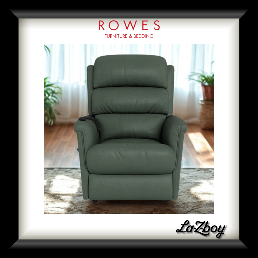Green recliner chair in a room with plants and curtains, featuring Rowes Furniture & Bedding logo.