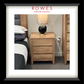 Wooden nightstand with lamp next to bed in a bedroom setting, featuring Rowes Furniture & Bedding logo.