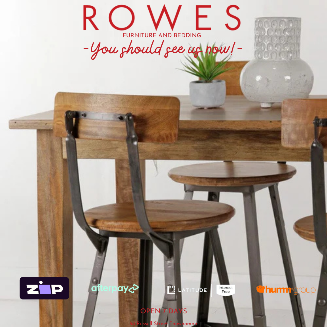 Wooden dining table with chairs and decorative items on a white background, featuring the brand 'Rowes'.