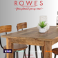 Wooden dining table with chairs and decor items on a gray background, featuring 'Rowes Furniture and Bedding' text.