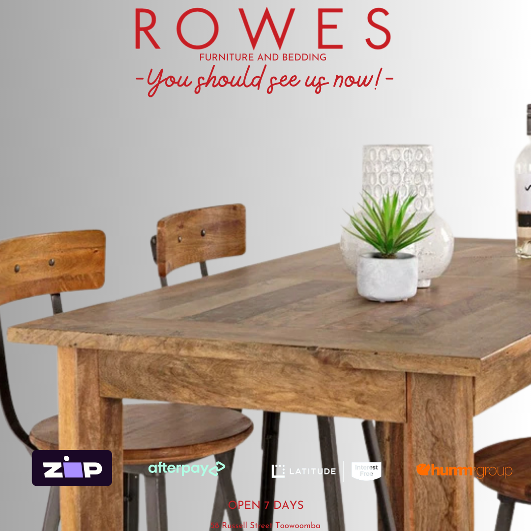 Wooden dining table with chairs and decor items on a gray background, featuring 'Rowes Furniture and Bedding' text.