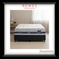 Mattress with decorative pattern on a bed frame, branded as SleepMaker, in a room setting.
