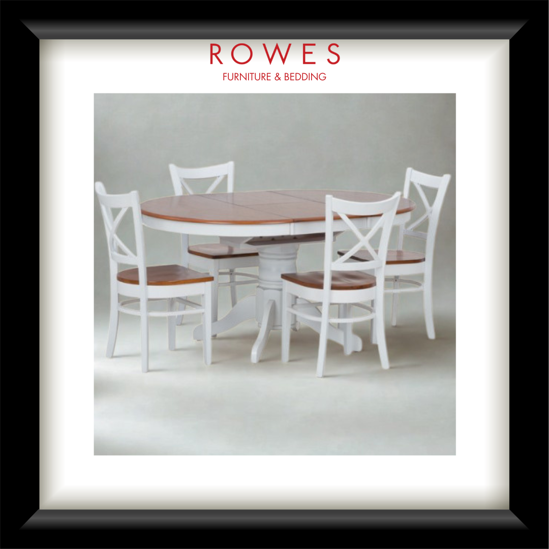 A white dining table surrounded by matching chairs. The top of the dining table and the seats of the chairs are all natural timber coloured. The Rowes branding is prominent. 