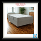 Gray mattress on a wooden floor with 'Rowes Furniture & Bedding' branding.