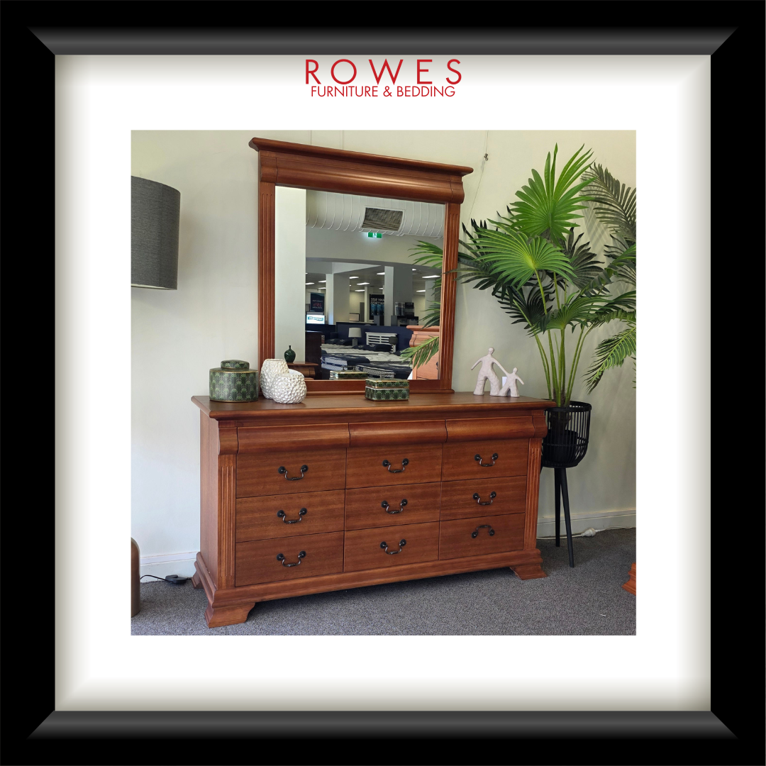 Wooden dresser with mirror on a shelf, featuring Rowes Furniture & Bedding logo.