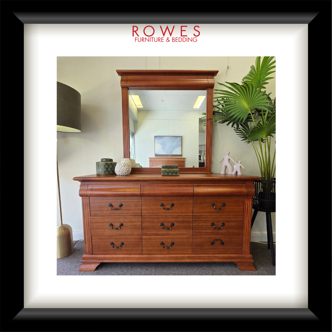 Wooden dresser with mirror on a white background, featuring Rowes Furniture & Bedding logo.