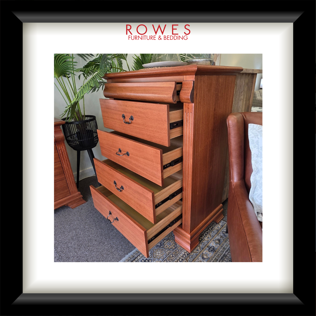Wooden dresser with multiple drawers in a room setting, featuring the Rowes Furniture & Bedding logo.