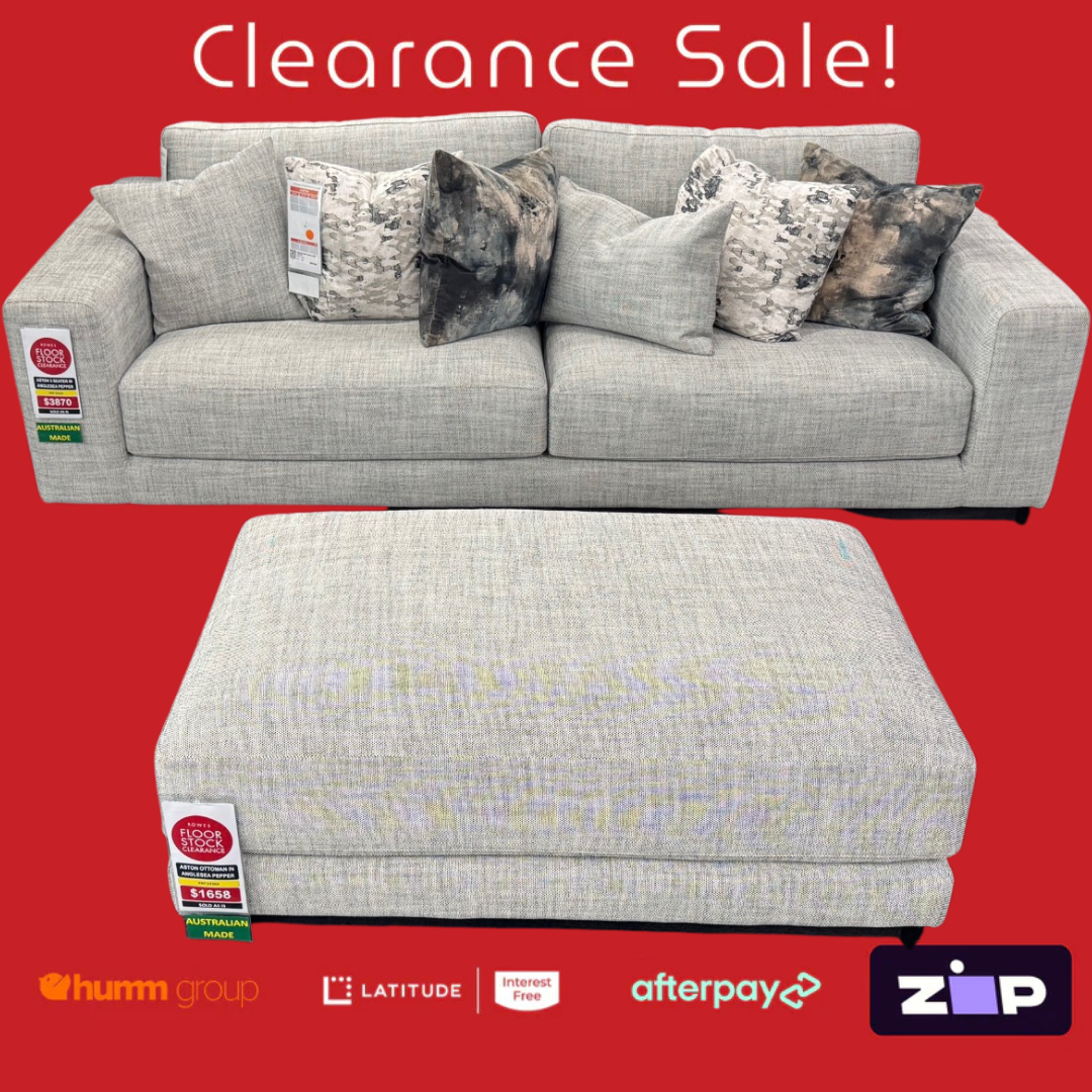 Gray sofa with patterned cushions on a red background, featuring clearance sale text and payment options.