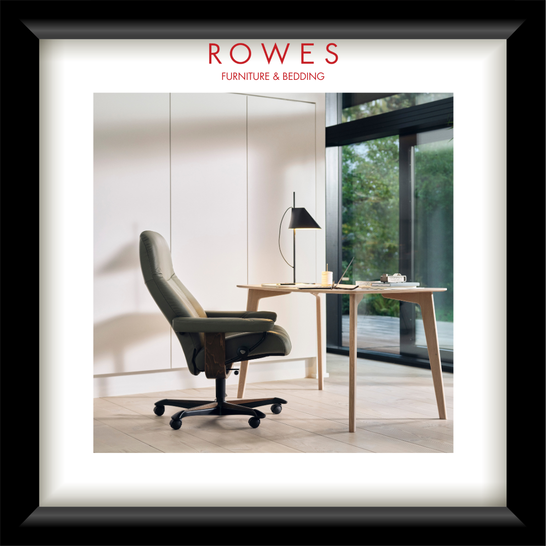 Modern office chair in a room with a desk and window, featuring Rowes Furniture & Bedding logo.