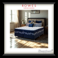 Blue and white mattress with decorative pillows on a bed in a bedroom setting, featuring Rowes Furniture & Bedding branding.