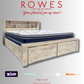 Wooden bed frame with mattress on a gray background, featuring 'Rowes Furniture and Bedding' branding.
