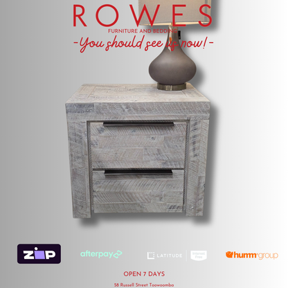 Gray wooden nightstand with a lamp on a gray background, featuring Rowes furniture branding.