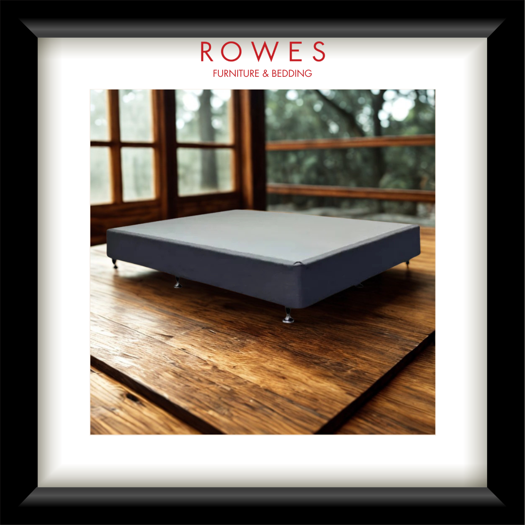 Blue mattress on a wooden floor with 'Rowes Furniture & Bedding' branding.