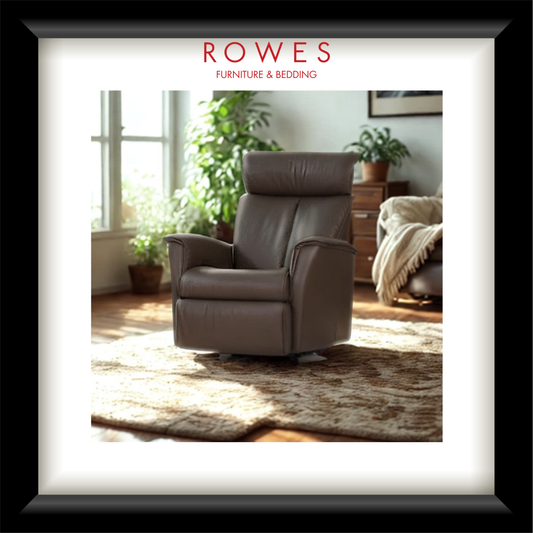Brown leather armchair in a room with plants and furniture, featuring 'Rowes Furniture & Bedding' branding.