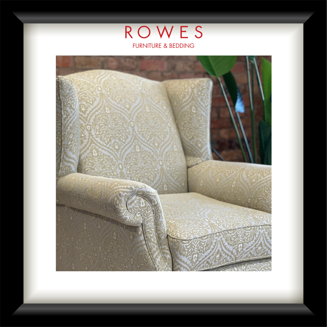 Patterned armchair with 'Rowes Furniture & Bedding' branding.