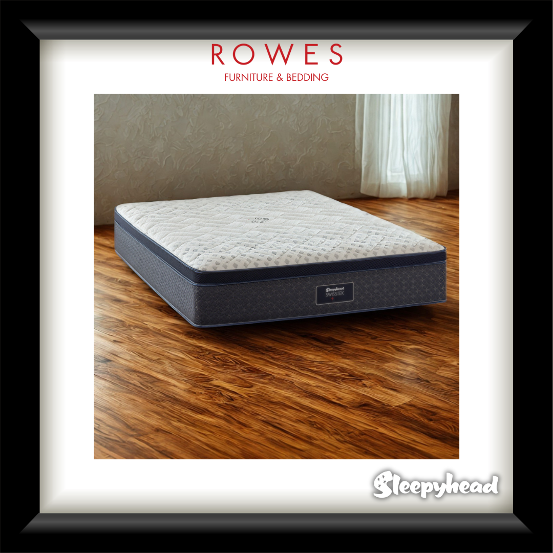 Mattress on a wooden floor with 'Rowes Furniture & Bedding' and 'Sleepyhead' branding.