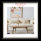 Living room with a sofa, coffee table, and wall art, featuring Rowes Furniture & Bedding logo.