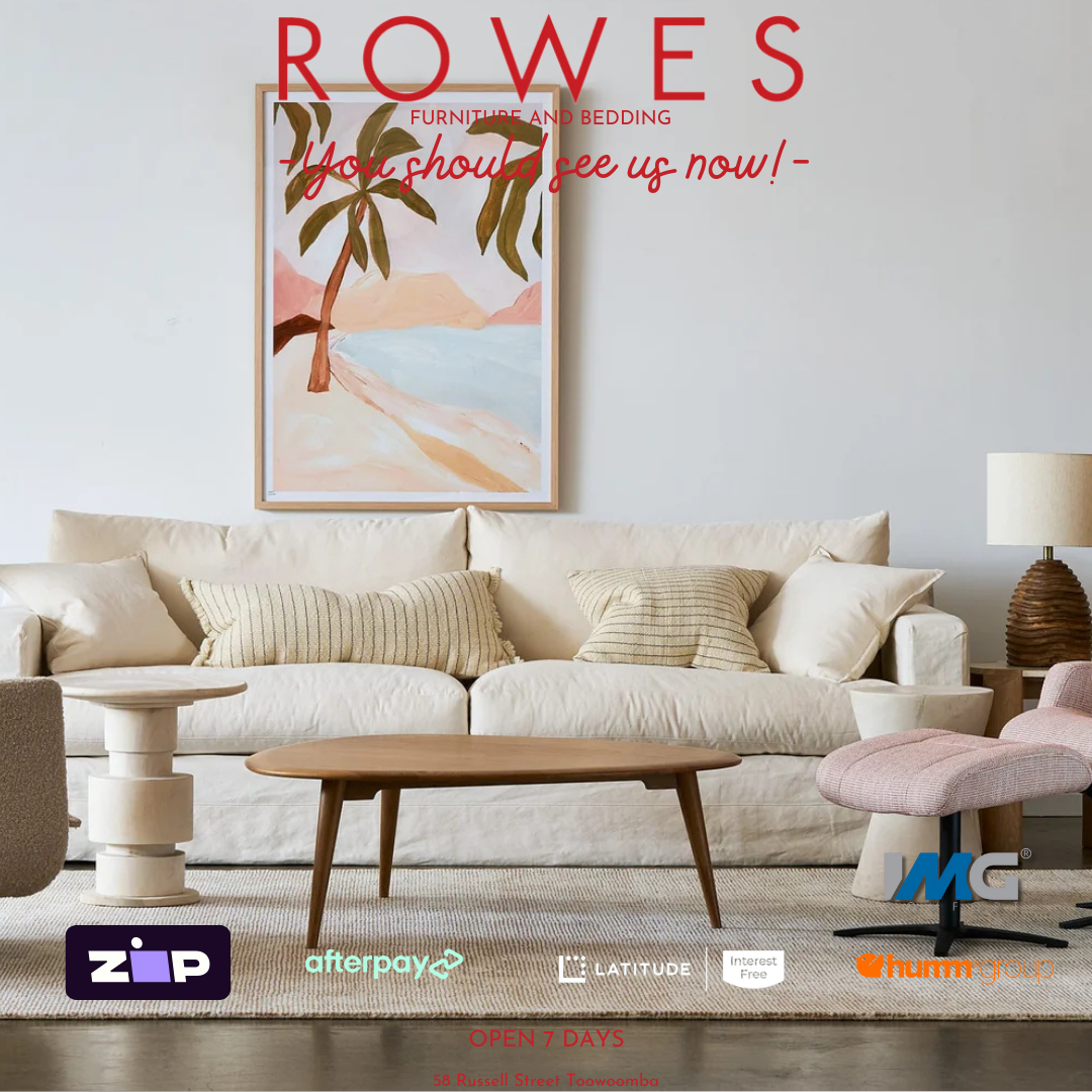 Modern living room with beige sofa, wooden coffee table, and decorative wall art. Advertises Rowes furniture and bedding.