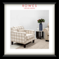 Plaid armchair in a room with a vase of flowers, featuring Rowes Furniture & Bedding logo.
