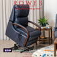 Blue recliner chair in a living room setting with 'Rowes' branding.