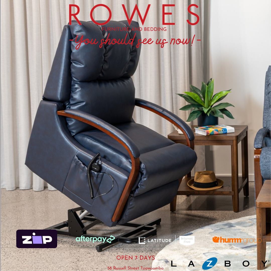 Blue recliner chair in a living room setting with 'Rowes' branding.