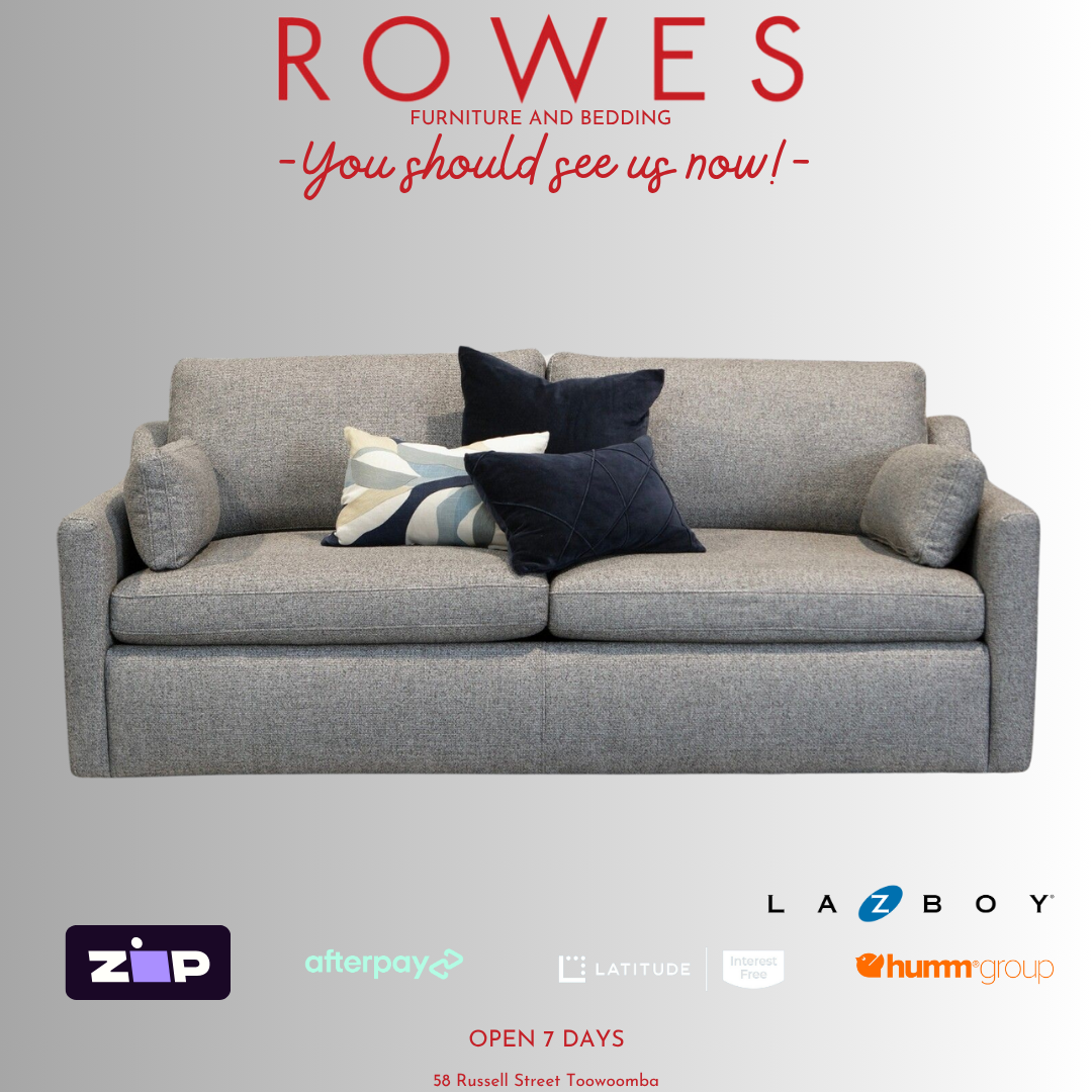 Gray sofa with decorative pillows on a gray background, featuring the brand 'Rowes'.