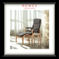 Gray armchair with ottoman and small table in a bright room with curtains, featuring 'Rowes Furniture & Bedding' branding.