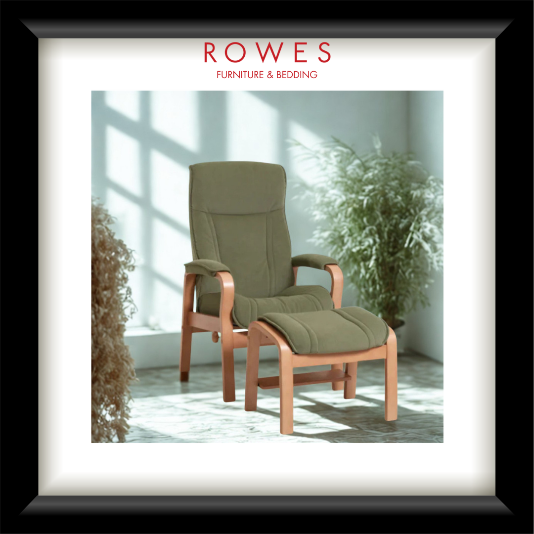 Green armchair with ottoman in a room with plants, featuring 'Rowes Furniture & Bedding' logo.