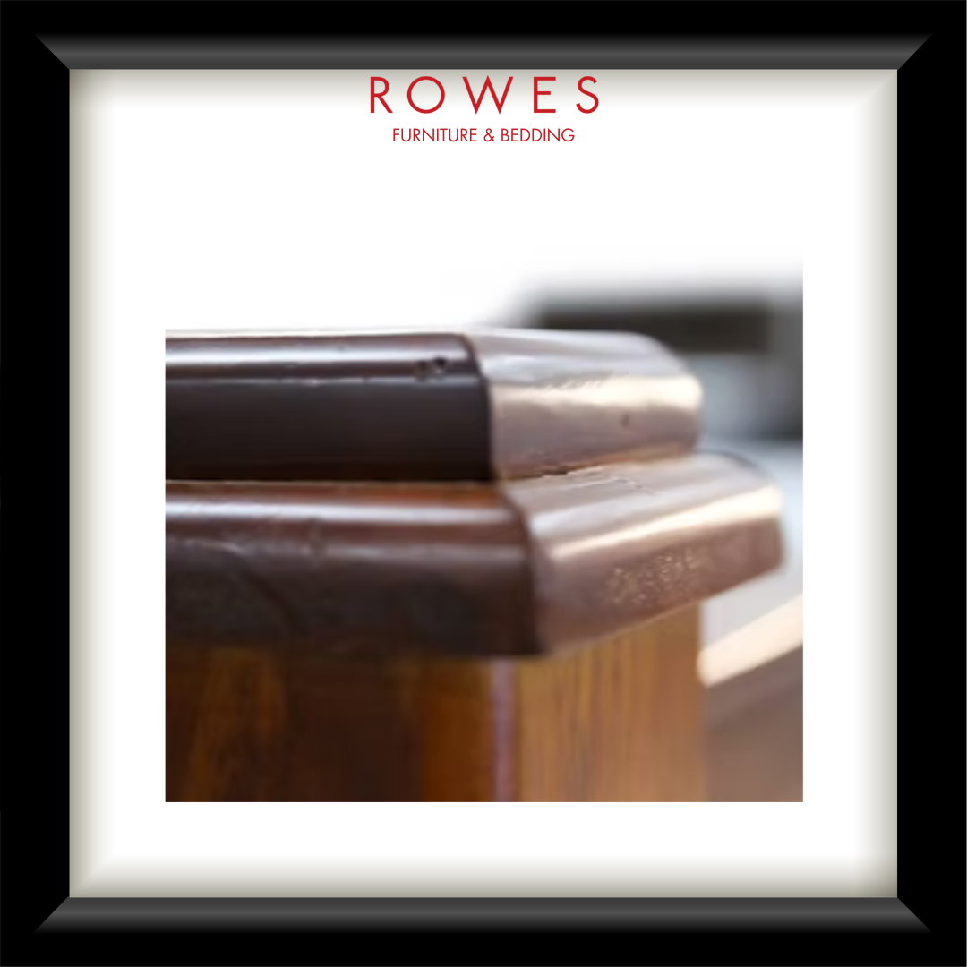 Close-up of wooden furniture with 'Rowes Furniture & Bedding' logo above.