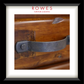 Close-up of a wooden product with metal strap and 'Rowes Furniture & Bedding' logo.