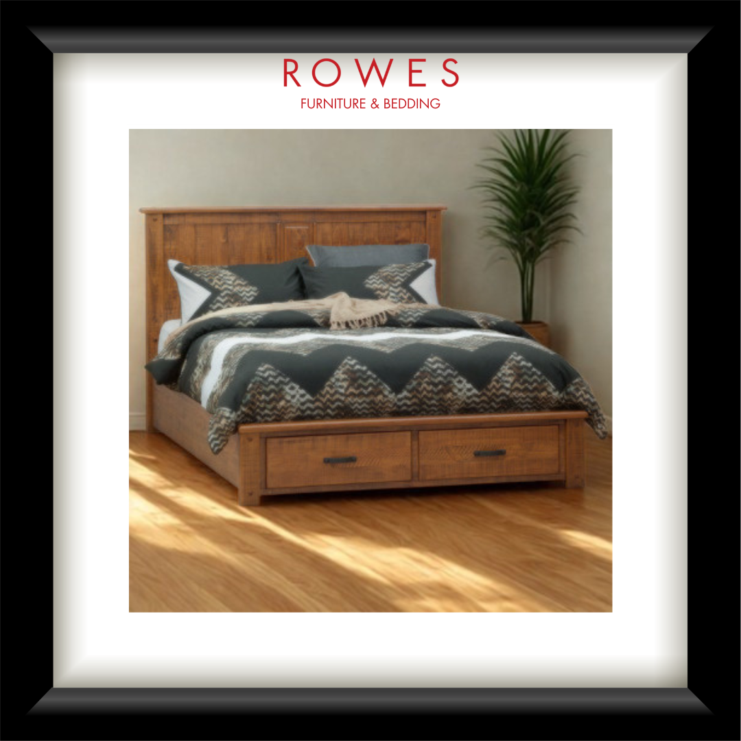 Wooden bed with bedding and drawers, featuring Rowes Furniture & Bedding logo.